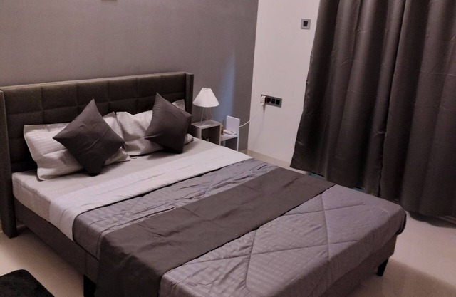 The Touch of Grey 1BHK Apartment with 2 Balcony