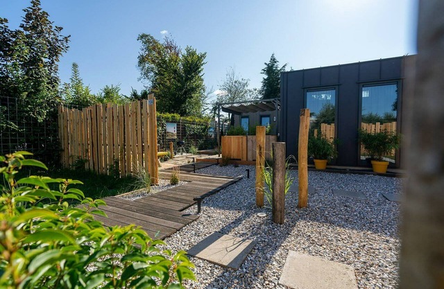 This attractively furnished holiday home with a large terrace, is located on a quiet family park and close to the sea and beach.