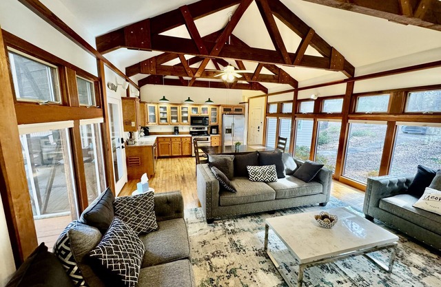 This gorgeous lakefront home with beautiful seasonal views