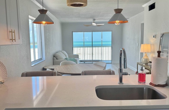Top-Floor Beachfront Corner Condo Fully Renovated, Sleeps 6, Steps to Sand
