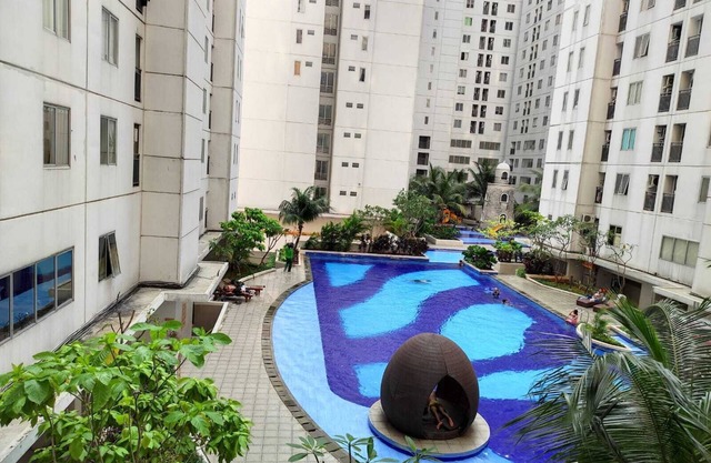 Toptravel Bassura City