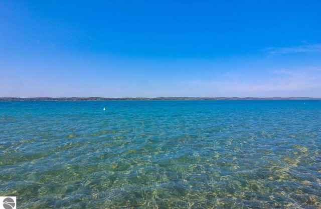 Torch Lake Sunsets With Private Dock