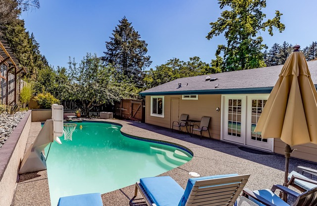 Tranquil dog-friendly cottage with outdoor pool, patio, gas grill, & yard