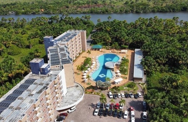 Two-bedroom resort in barreirinhas with pool and river views