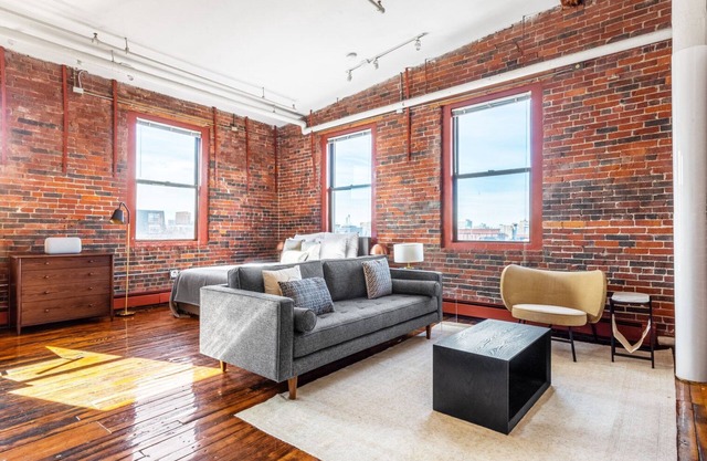 Unique South End Loft w/ Pool, Art Gallery, Steps to T by Blueground