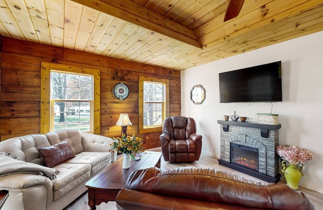 Updated and peaceful home with open layout, fireplace, streaming, deck, AC