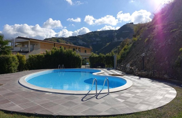 Casa de vacaciones "Terrazzo A9" con vistas al mar, piscina compartida y Wi-Fi