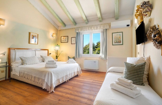 Habitación 'Verde' con Jardín Compartido, Wi-Fi y Aire Acondicionado