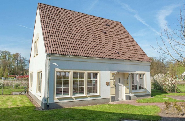 Villa con jardín privado