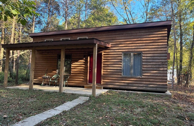 Visit this rustic cabin snuggled deep in the heart of the Shawnee Forest