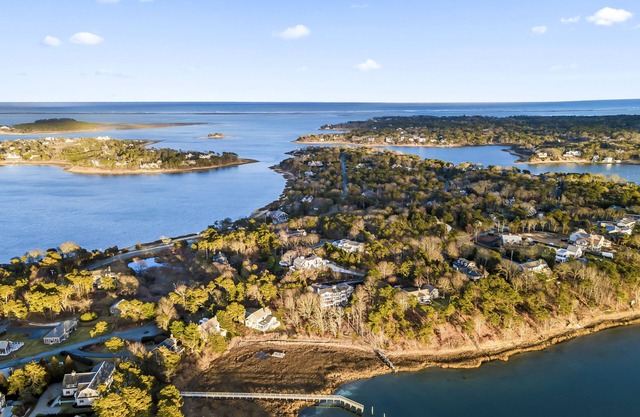 Water views, private beach and spectacular sunsets from highest point in town.