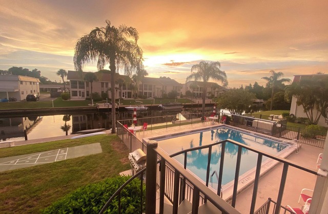 WATERFRONT Condo with pool. Great views of sunsets. Condo is like new!