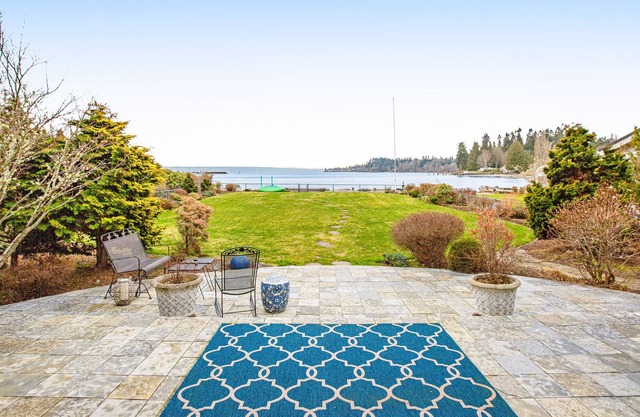 Waterfront home on Puget Sound with hot tub, grill, kayaks, & sunrise view