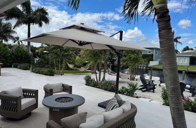 WATERFRONT HOME WITH 60 FOOT DOCK AND RESORT STYLE BACKYARD