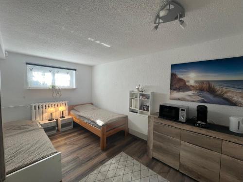Eichsfelder Kessel Apartamento | 1-Raum Ferienwohnung Souterrain Niederorschel