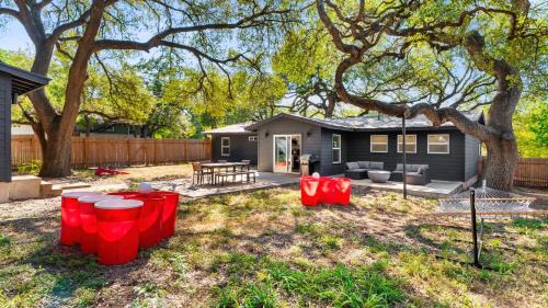 Walnut Forest Casa | 10 Min to Downtown - Modern 4BR Oasis - Yard Games
