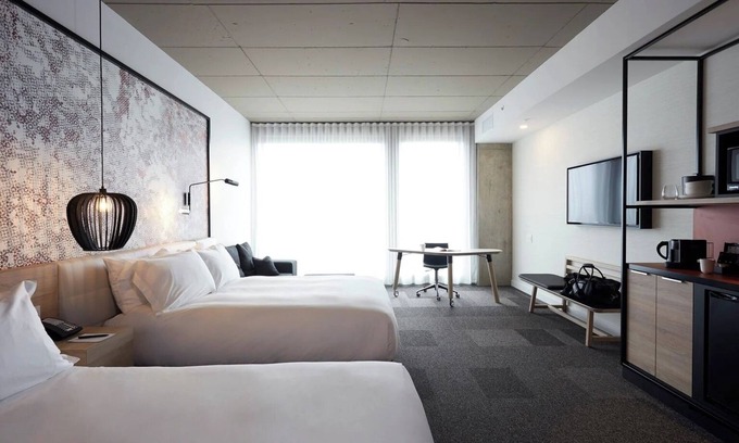 Brossard Hotel | 2 Comfortable Rooms w/Work-Ready Space + Family-Friendly Layout in Brossard