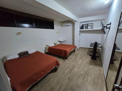 Zona Centro Apartamento | 2 Recamaras con clima y cocina centrico, wifi, tv smart