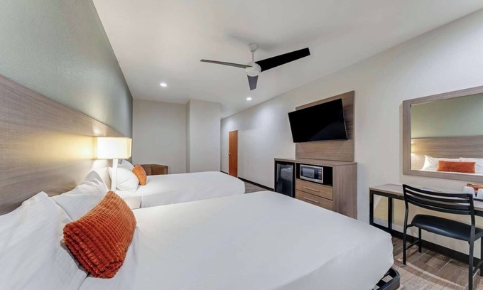 Eastside Promise Neighborhood Hotel | 2 Spacious Room w/ Complimentary Breakfast Ideal for Group Business Trip