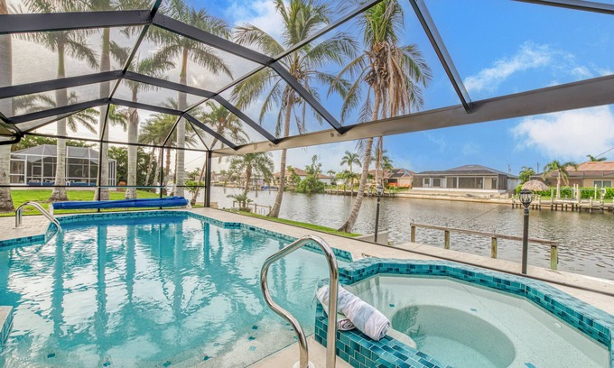 Pelican Casa | 3/2 actualizado acceso al Golfo canal piscina climatizada eléctrica y jacuzzi - Coconut Cove