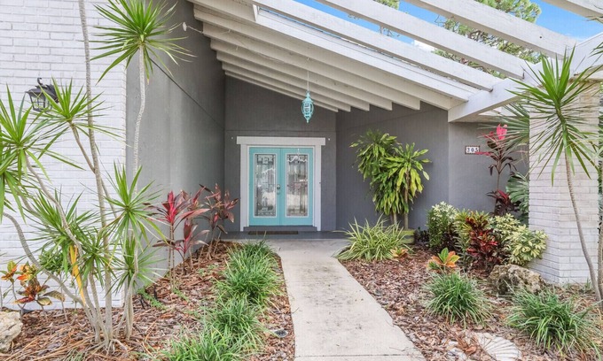 West Bradenton Casa | 4BR Saltwater Pool Oasis, Game Room, Outdoor Spa, & Tropical Garden Retreat