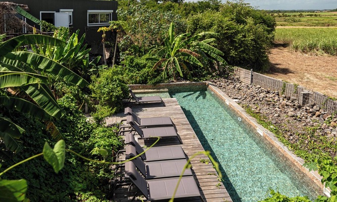 Petit-Canal Apartamento | A 65m2 apartment for a romantic getaway with views over the sugarcane fields