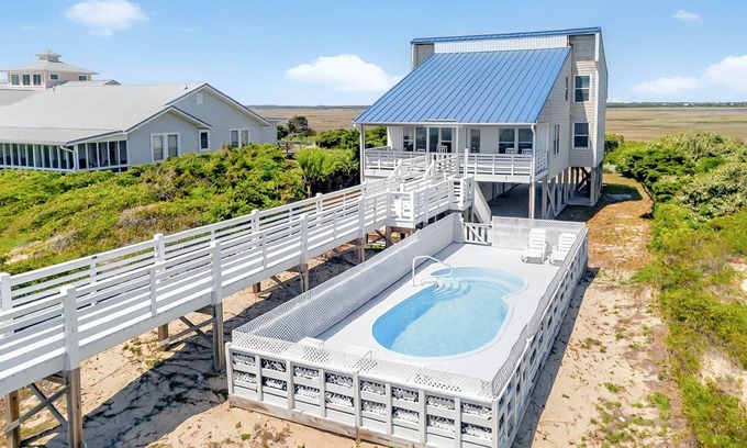 Caswell Beach Casa | A Coconut Hut on Caswell beach, Ocean front home with heated pool, new walkway to beach