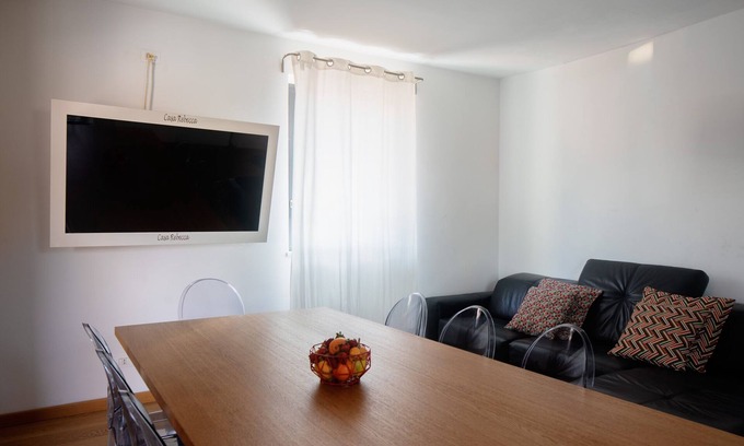 Coste Casa | A design corner with a view of Etna