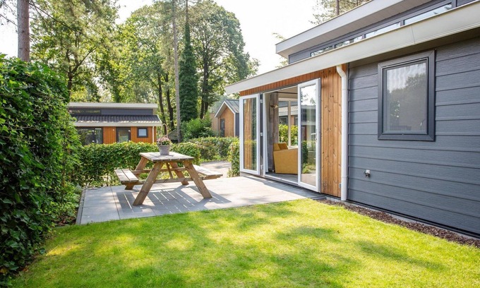 Rhenen Casa | A pleasant atmosphere, cozy furnishings and an open gazebo with lounge set! Nice that Forest Lodge!
