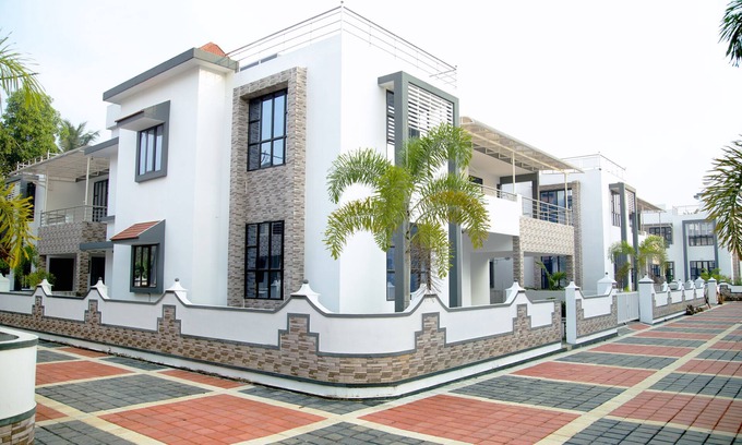 Nedumbassery Villa | Estética de vacaciones cerca de Kochi Aeropuerto