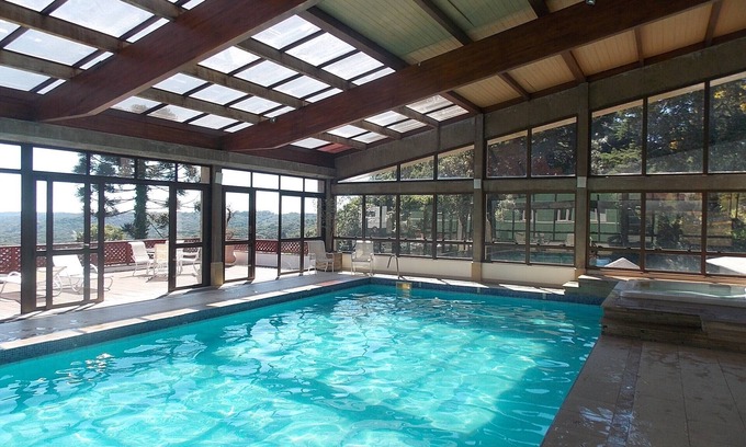 Floresta Apartamento | Apart hotel en Gramado, con Spa, piscina térmica, sauna, chimenea.
