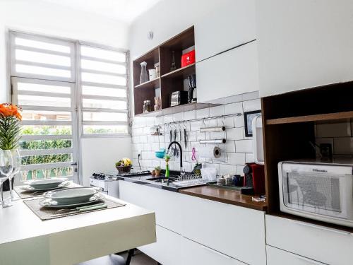 Alto de Pinheiros Apartamento | Apartamento com quintal em Alto de Pinheiros