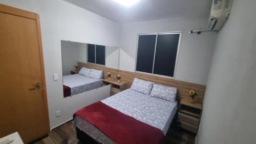 Carumbe Apartamento | Apartamento em condomínio proximo ao shopping Pantanal e parque tia Nair