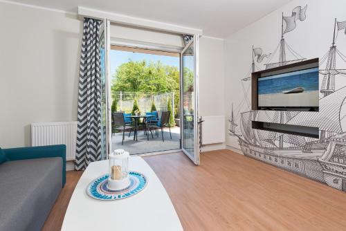 Rozewie Apartamento | Apartamenty, Domki i Pokoje ze śniadaniem Kajan