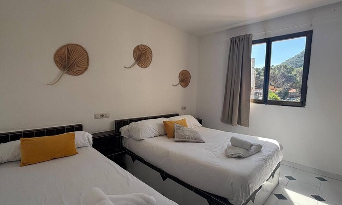 Portinatx Apartamento | Apartamento '5personas Vista Jardi4C' con vistas al mar, Wi-Fi y aire acondicionado