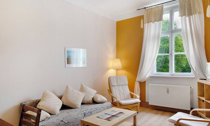 Krakow am See Apartamento | Apartamento 'Ferienwohnung 5' con terraza compartida, jardín compartido