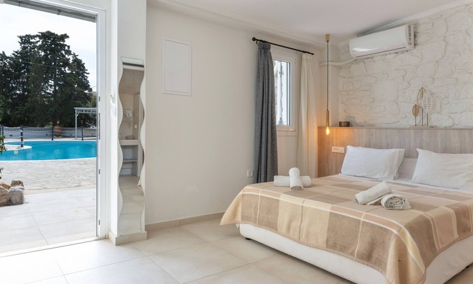 Panormos Apartamento | Apartamento 'No 16' con piscina compartida, Wi-Fi y aire acondicionado