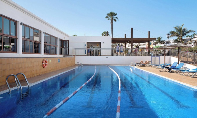 Playa Blanca Apartamento | Apartamento 'Playa Flamingo 34' cerca de la playa con vistas al mar, piscina y terraza