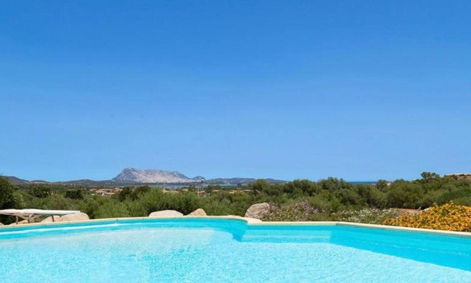 San Teodoro Villa | 'Appartamento Runcina 1' con vistas al mar, Wi-Fi y piscina compartida