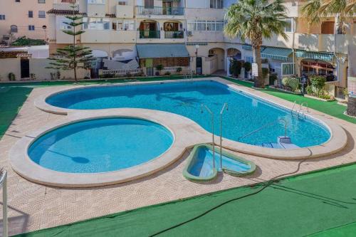 Torrevieja Apartamento | Apartment Santana -19 at Beach with Pool, Garage and Lift