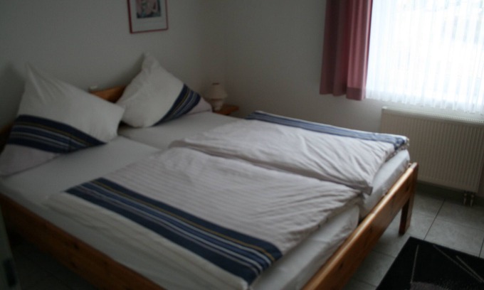 Bad Driburg Apartamento | Apartamento con balcón en la casa de huéspedes Therme-Blick