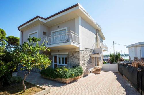 Fertilia Casa | Appartamento 150 mq in villa sul mare a Fertilia
