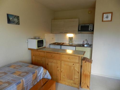 Le Pleynet Apartamento | Appartement cosy au pied des pistes avec balcon, ascenseur, casier à skis et parking gratuit - FR-1-557A-36