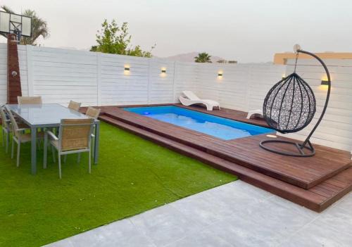 Eilat Villa | Ariel house-אריאל האוס 4 חדרי שינה וסלון
