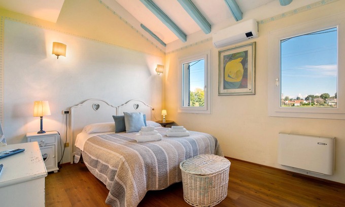 Mirano Apartamento | Habitación 'Azzurra' con Jardín Compartido, Wi-Fi y Aire Acondicionado