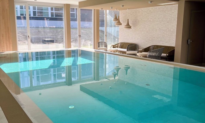 Bad Saarow Apartamento | Bad Seerose, cozy vacation apartment with lake view, roof terrace, pool and sauna