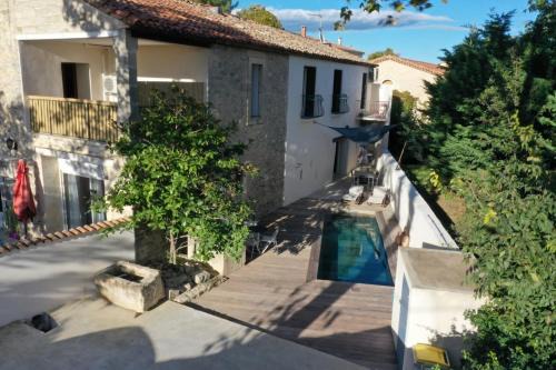 Saint-Bauzille-de-Montmel Casa | Bardelours 1 Charming house with swimming pool in the heart of the Pic Sa