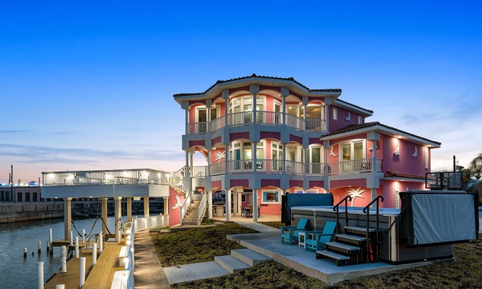 Port Isabel Casa | Bayfront home with dock, private elevator, central AC & grill -snowbird-friendly