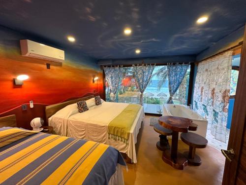 Santa María Tonameca Hotel | Beachfront Paradise Boutique Hotel - Alebrijes Jacuzzi Suits