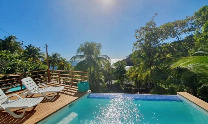 Taquillo Villa | Beachfront Villa with Infinity Pool & Ocean Views – Surf City